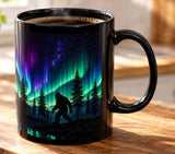 Bigfoot Northern Lights Mug, Sasquatch Aurora Borealis Coffee Cup, Nature Lover Gift, Cryptid Forest Drinkware, Outdoor Hiker Ceramic Mug